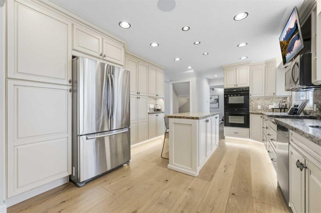 20 Mapleglade Close Se, Calgary, AB - Indoor Photo Showing Kitchen With Upgraded Kitchen