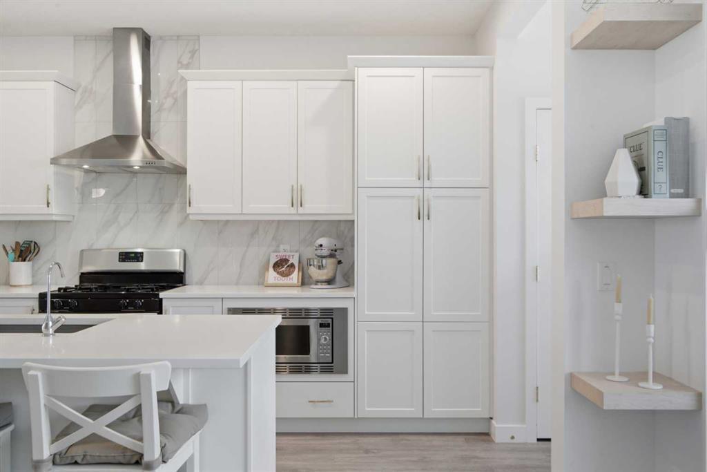 406 Masters Road Se, Calgary, AB - Indoor Photo Showing Kitchen With Double Sink