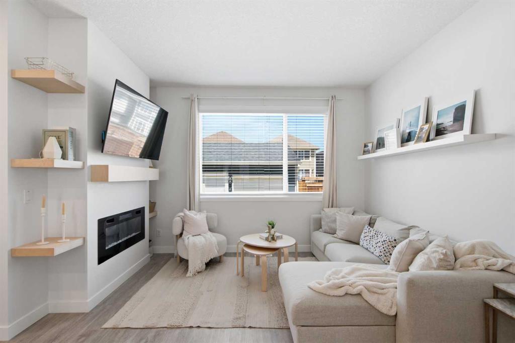 406 Masters Road Se, Calgary, AB - Indoor Photo Showing Living Room With Fireplace