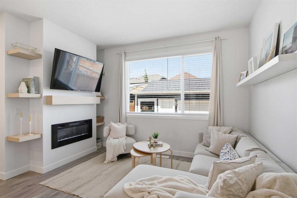 406 Masters Road Se, Calgary, AB - Indoor Photo Showing Living Room With Fireplace