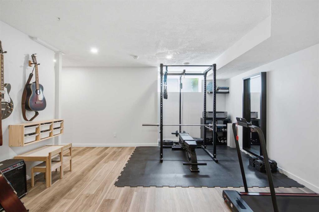 406 Masters Road Se, Calgary, AB - Indoor Photo Showing Gym Room