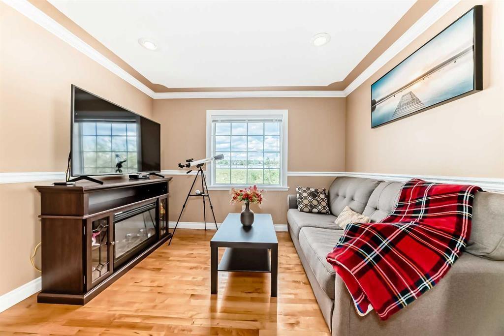 146 Scenic View Close, Calgary, AB - Indoor Photo Showing Living Room With Fireplace
