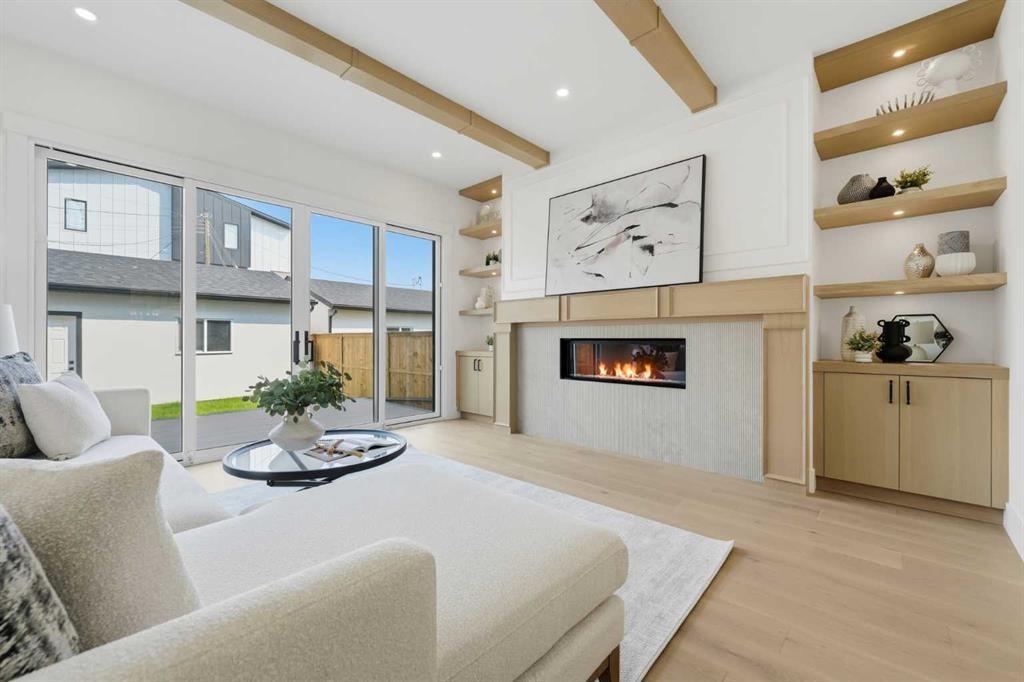 2004 51 Avenue Sw, Calgary, AB - Indoor Photo Showing Living Room With Fireplace