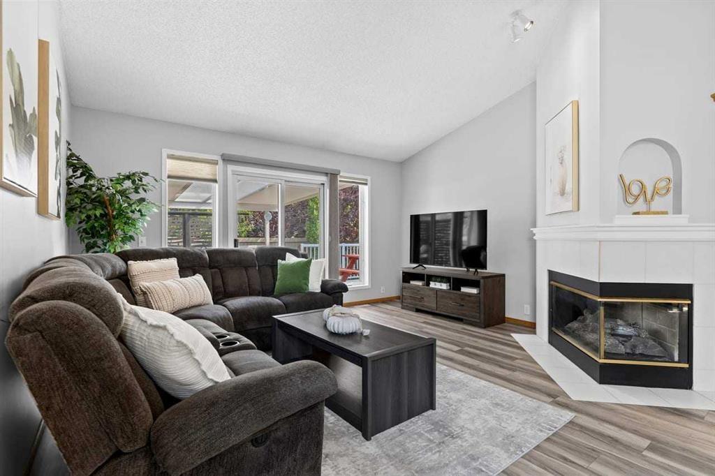 26 Chaparral Close Se, Calgary, AB - Indoor Photo Showing Living Room With Fireplace