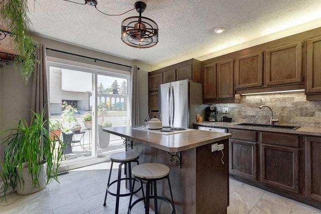 103-1305 Glenmore Trail SW Calgary, AB T2V 4Y8