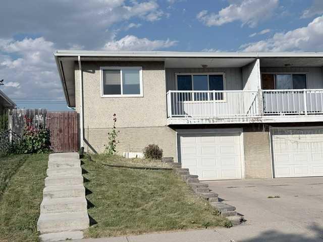 31 Huntford Road NE Calgary, AB T2K 3Y8
