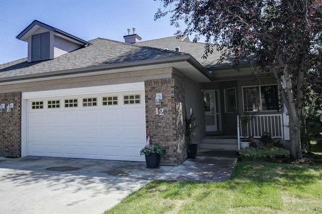 12 Straddock Villas SW Calgary, AB T3H 5C7