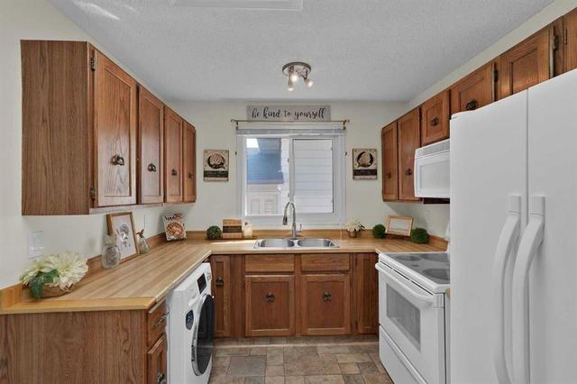 27 Bedridge Way NE Calgary, AB T3K 1M2