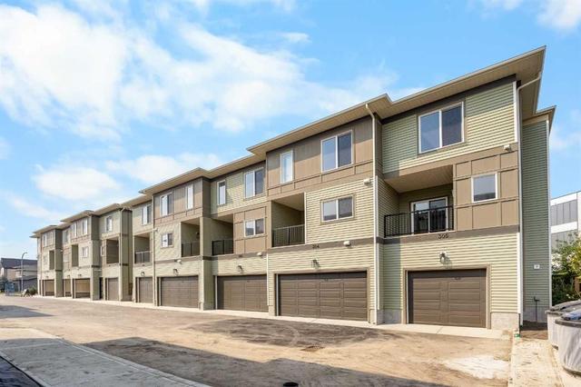 305-67 Panatella Square NW Calgary, AB T3K 2S7