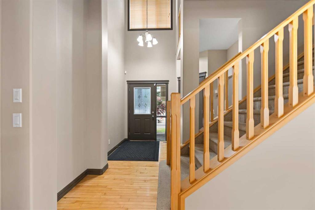 49 Panamount Rise Nw, Calgary, AB - Indoor Photo Showing Living Room With Fireplace