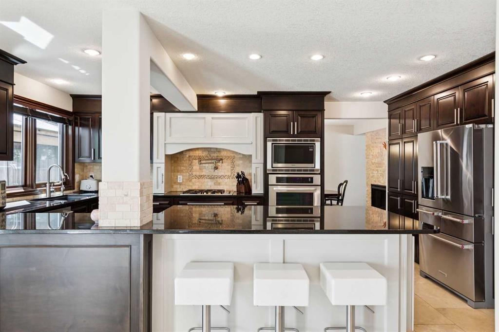 223 Pump Hill Crescent, Calgary, AB - Indoor Photo Showing Kitchen With Upgraded Kitchen