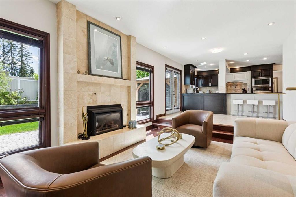 223 Pump Hill Crescent, Calgary, AB - Indoor Photo Showing Living Room With Fireplace