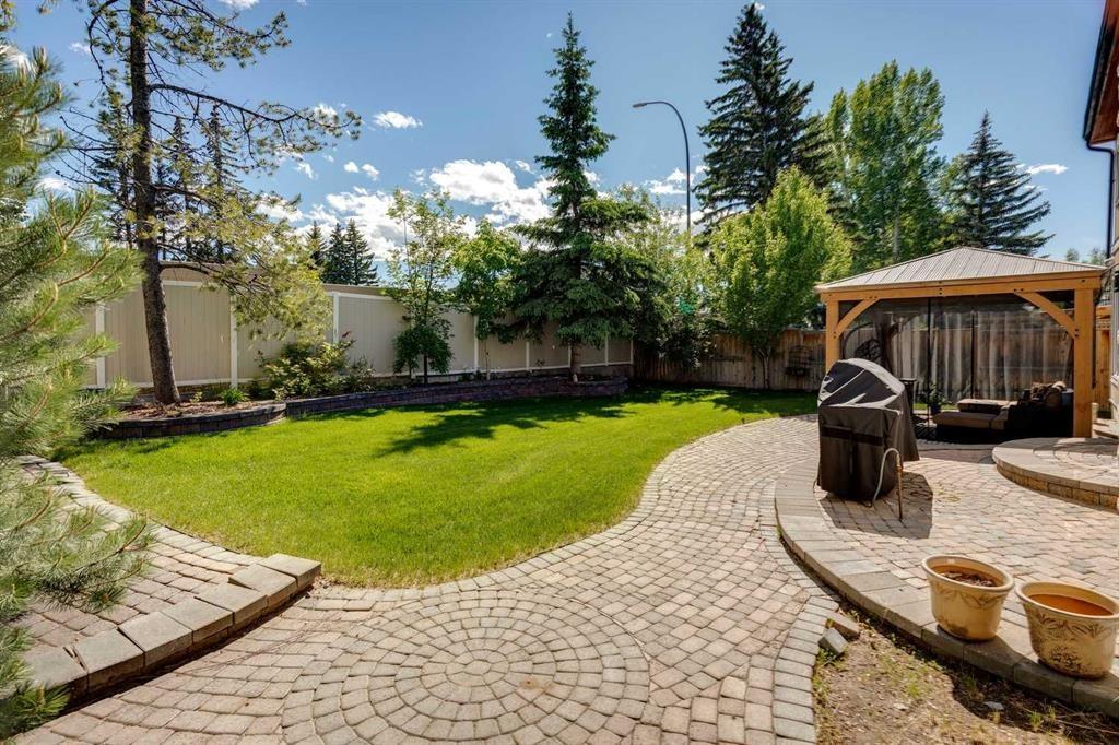 223 Pump Hill Crescent, Calgary, AB - Outdoor With Backyard