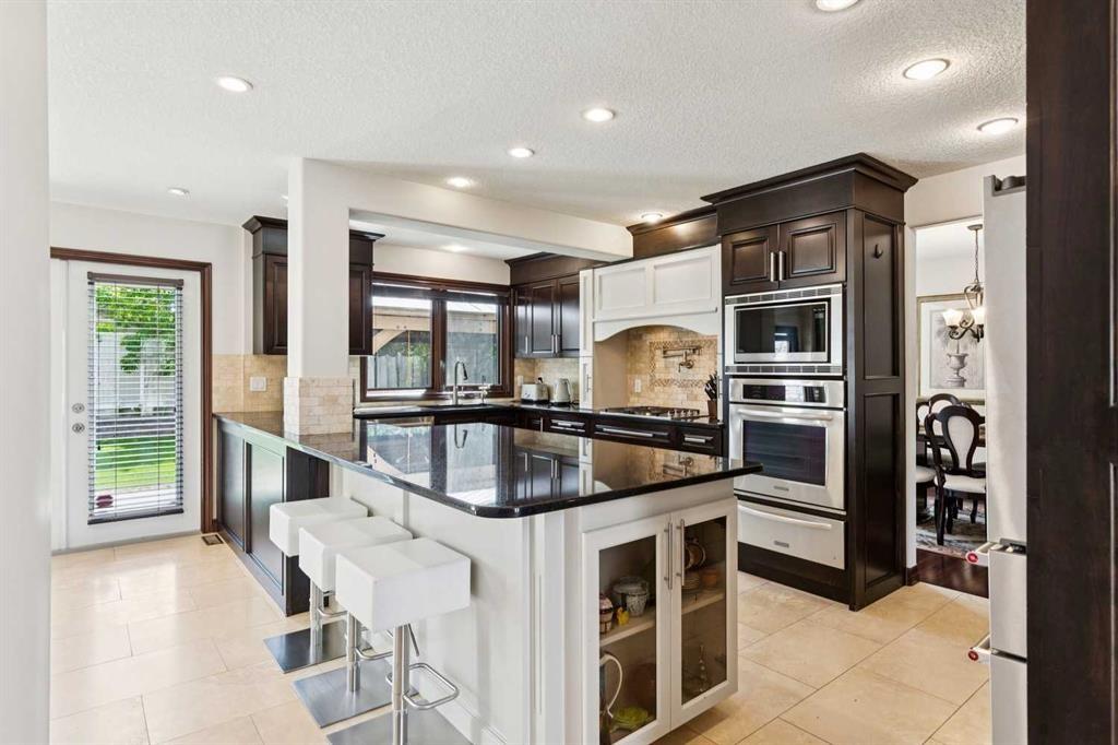 223 Pump Hill Crescent, Calgary, AB - Indoor Photo Showing Kitchen With Upgraded Kitchen