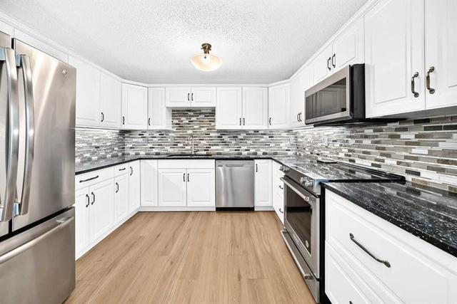 8 Hawkfield Crescent NW Calgary, AB T3G 1Z5