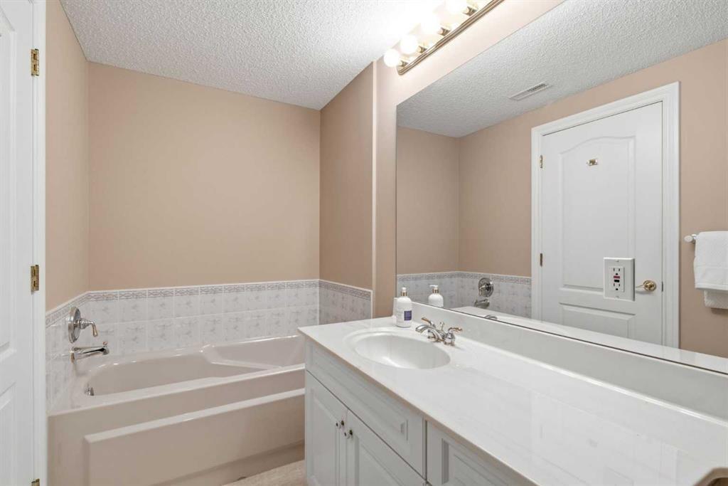 60 Prominence Point Sw, Calgary, AB - Indoor Photo Showing Bedroom
