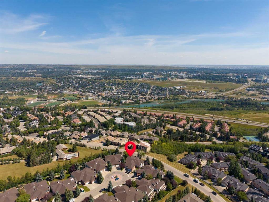 60 Prominence Point Sw, Calgary, AB - Outdoor With Deck Patio Veranda With View With Exterior