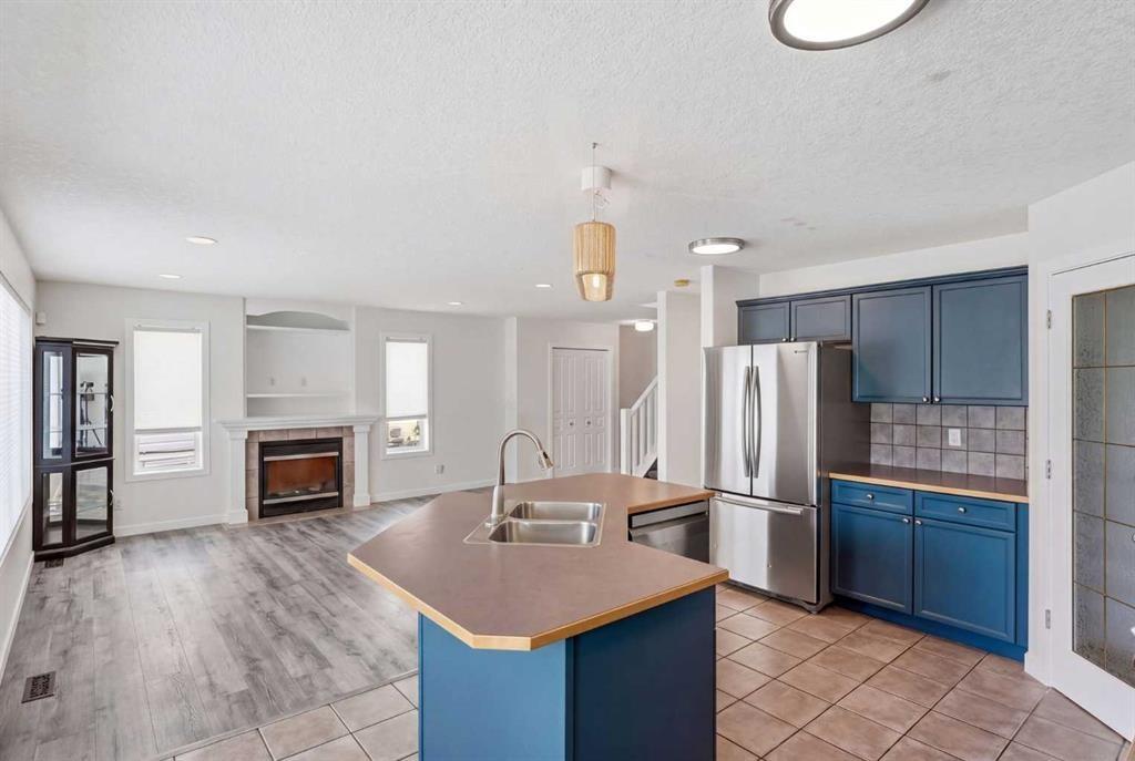 235 Arbour Stone Place Nw, Calgary, AB - Indoor Photo Showing Kitchen With Stainless Steel Kitchen With Double Sink