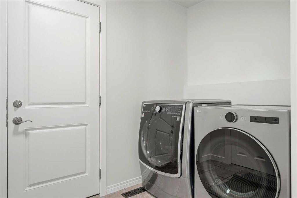 235 Arbour Stone Place Nw, Calgary, AB - Indoor Photo Showing Laundry Room