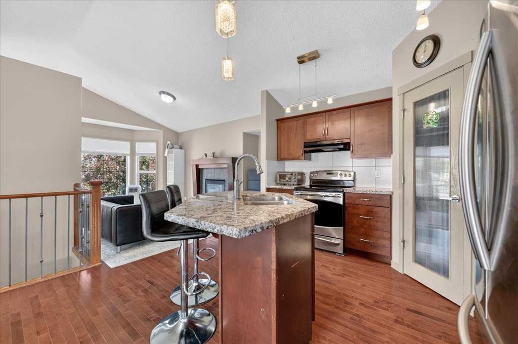 139 Silverado Way Sw, Calgary, AB - Indoor Photo Showing Kitchen With Double Sink