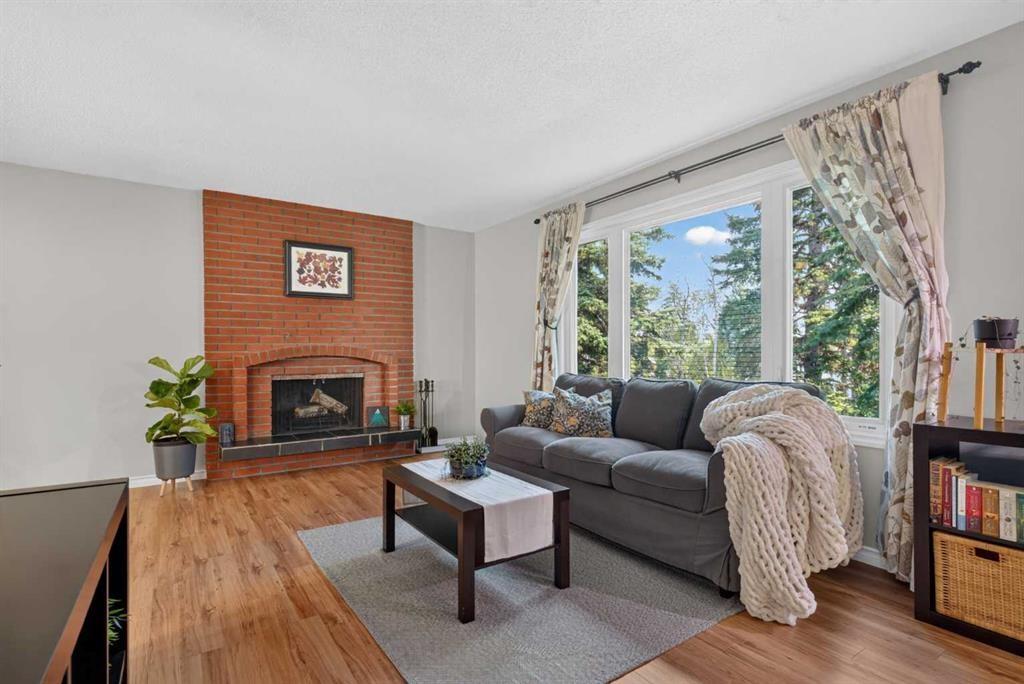 292 Silver Brook Way Nw, Calgary, AB - Indoor Photo Showing Living Room With Fireplace