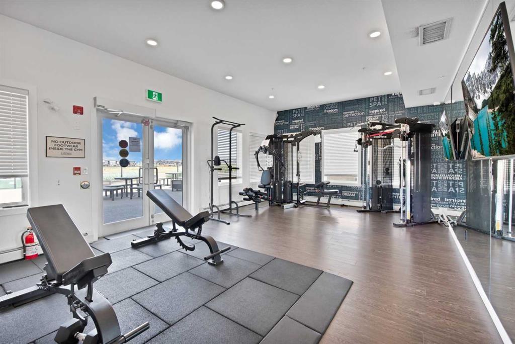 2101-76 Cornerstone Passage Ne, Calgary, AB - Indoor Photo Showing Gym Room