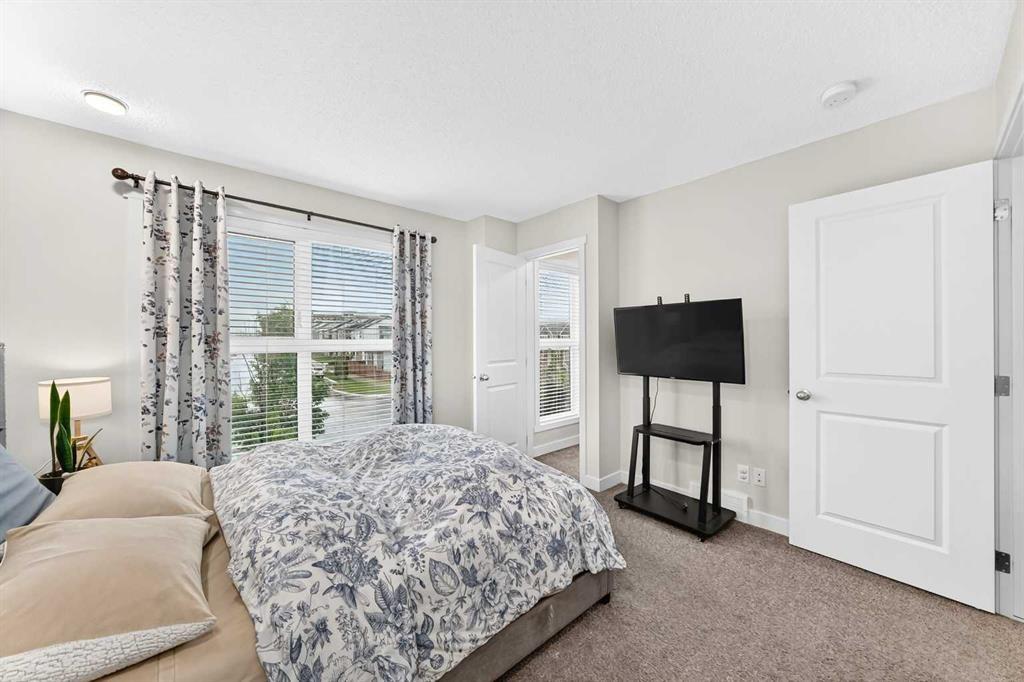112 Carrington Boulevard Nw, Calgary, AB - Indoor Photo Showing Bedroom