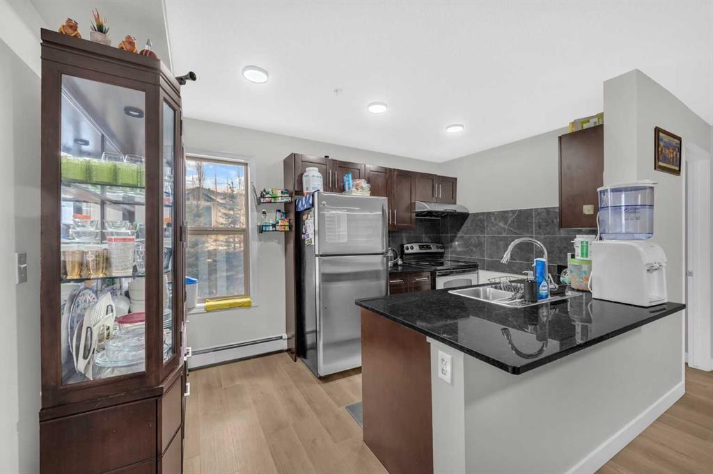 227-355 Taralake Way Ne, Calgary, AB - Indoor Photo Showing Kitchen With Double Sink