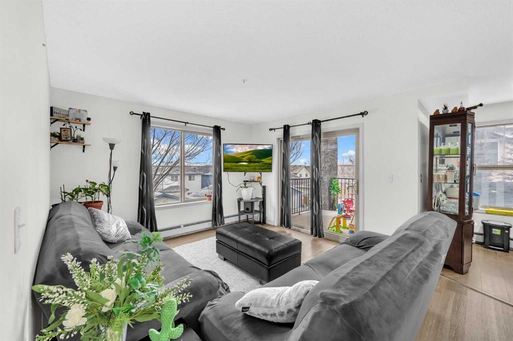 227-355 Taralake Way Ne, Calgary, AB - Indoor Photo Showing Living Room