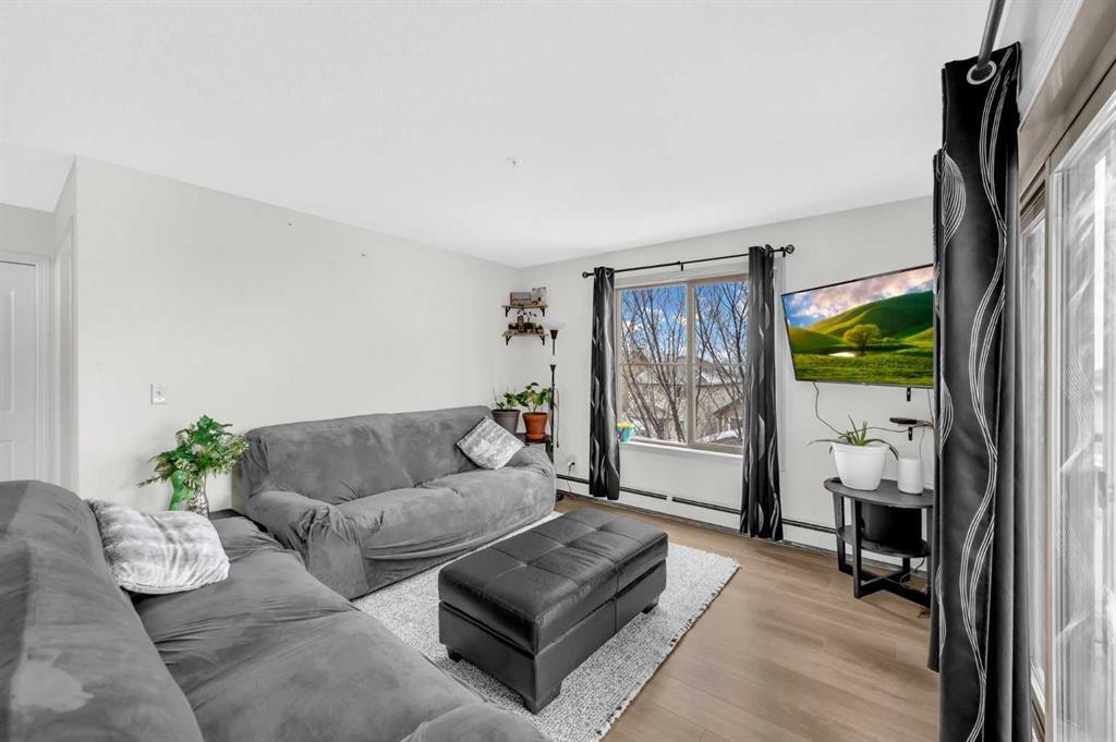227-355 Taralake Way Ne, Calgary, AB - Indoor Photo Showing Living Room