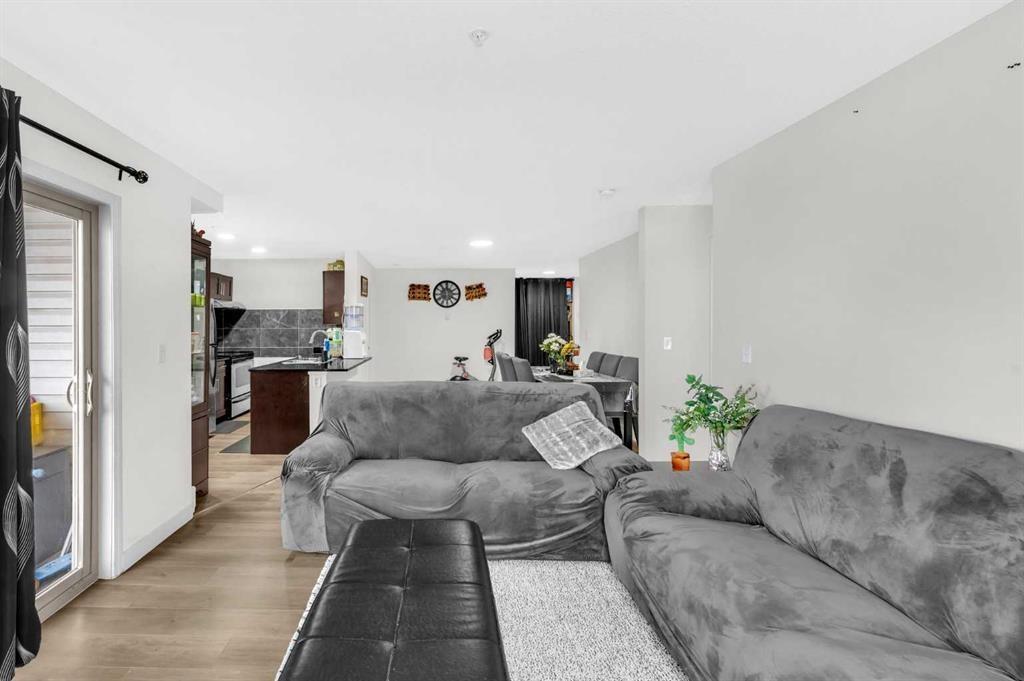 227-355 Taralake Way Ne, Calgary, AB - Indoor Photo Showing Living Room